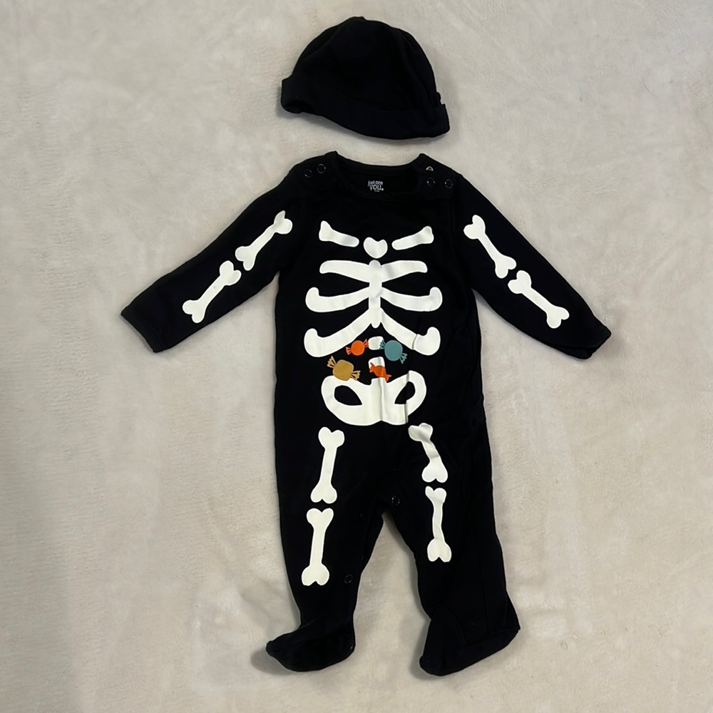 Carter’s skeleton glow in the dark footed onesie with hat